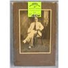Image 1 : Elegantly dressed gentleman w/ cane photo