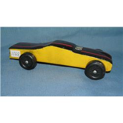 Modern wooden folk art race car