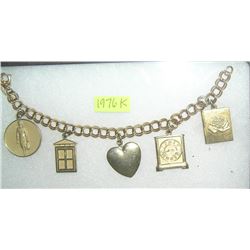 Avon sales rep award winning charm bracelet