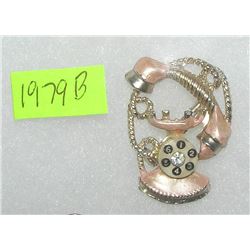 Telephone shaped pin with semi precious stone
