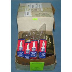 Box full of vintage mupiltible size light bulbs
