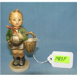 Boy with basket piano baby