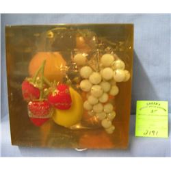 Large fruit decorated Lucite paperweight