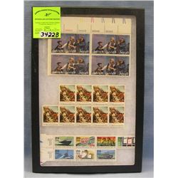 Collection of vintage US postage stamp sheets