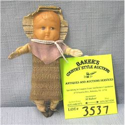 Vintage celluloid faced baby doll