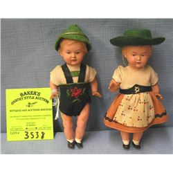 Pair of early celluloid Bavarian dolls