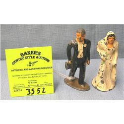 Early cast metal bride and groom figure set