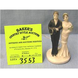 Vintage bisque bride and groom figurine