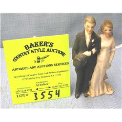 Vintage bisque bride and groom figurine