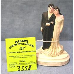 Larger chalkware bride and groom figure