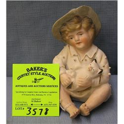 Vintage bisque piano baby doll with cat