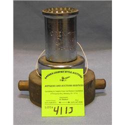Antique brass fire nozzle by Elkhart brass company
