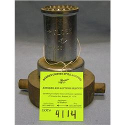 Antique brass fire nozzle by Elkhart brass company