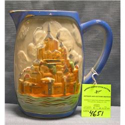 Early castle decorated glazed over art pottery pitcher