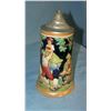 Image 1 : Vintage German beer stein features festive group of 3