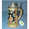 Image 2 : Vintage German beer stein features festive group of 3