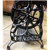 Image 3 : EATON'S ANTIQUE TREADLE SEWING MACHINE IN CABINET