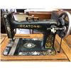 Image 4 : EATON'S ANTIQUE TREADLE SEWING MACHINE IN CABINET