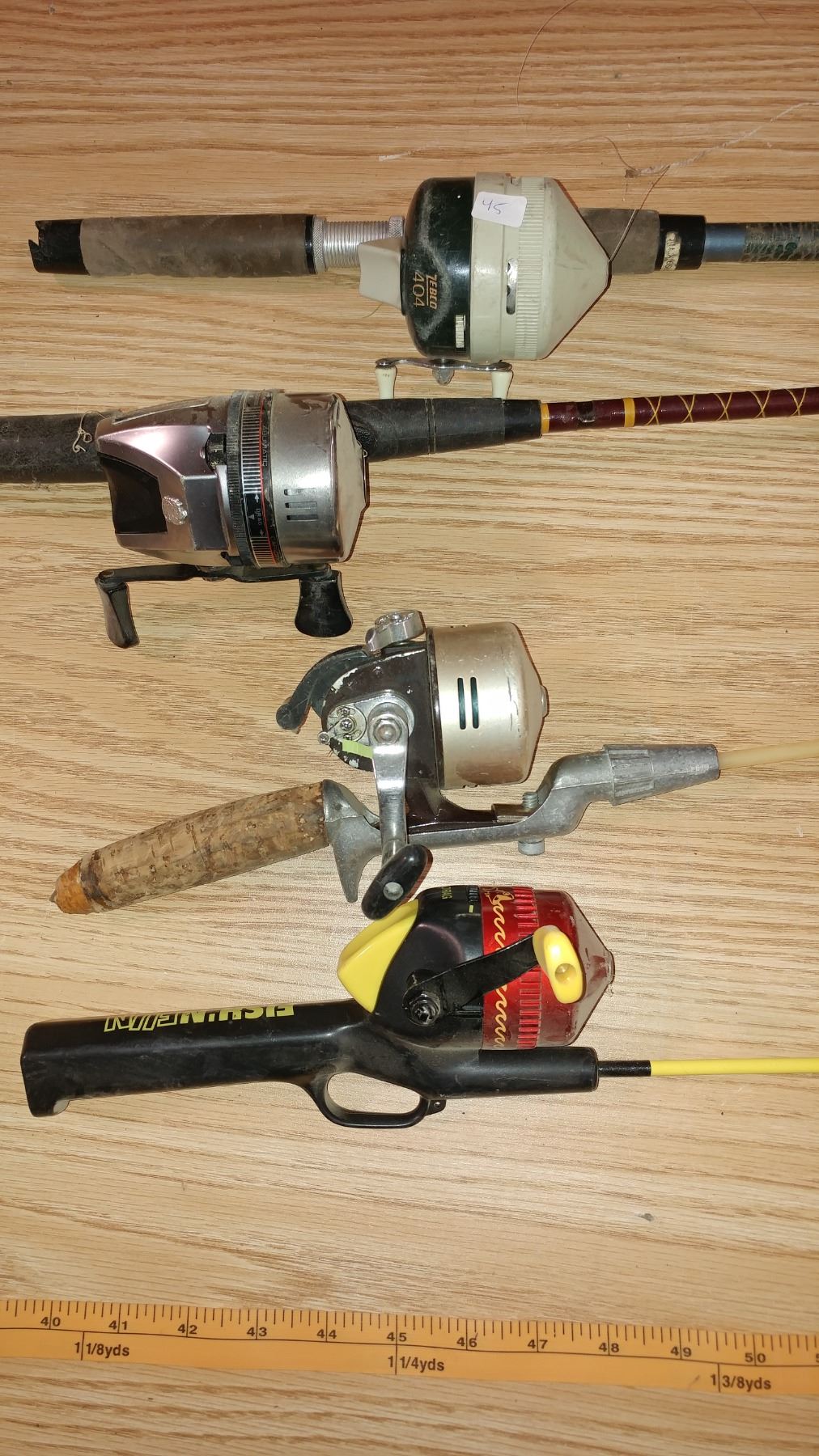 LOT OF FOUR FISHING RODS (VARIOUS LENGTHS)