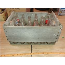 LOT OF ASSORTED BOTTLES IN A WOODEN CRATE