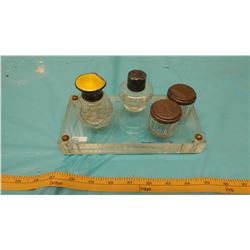 PLASTIC TRAY AND FOUR SALT CELLARS