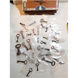 35 ANTIQUE SKELETON KEYS (LARGE AND SMALL) *IN CIGAR BOX*
