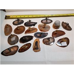 LARGE LOT OF POLISHED ROCK SLICES WITH ORNAMENTAL FIGURES ATTACHED