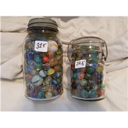 2 JARS FULL OF MARBLES