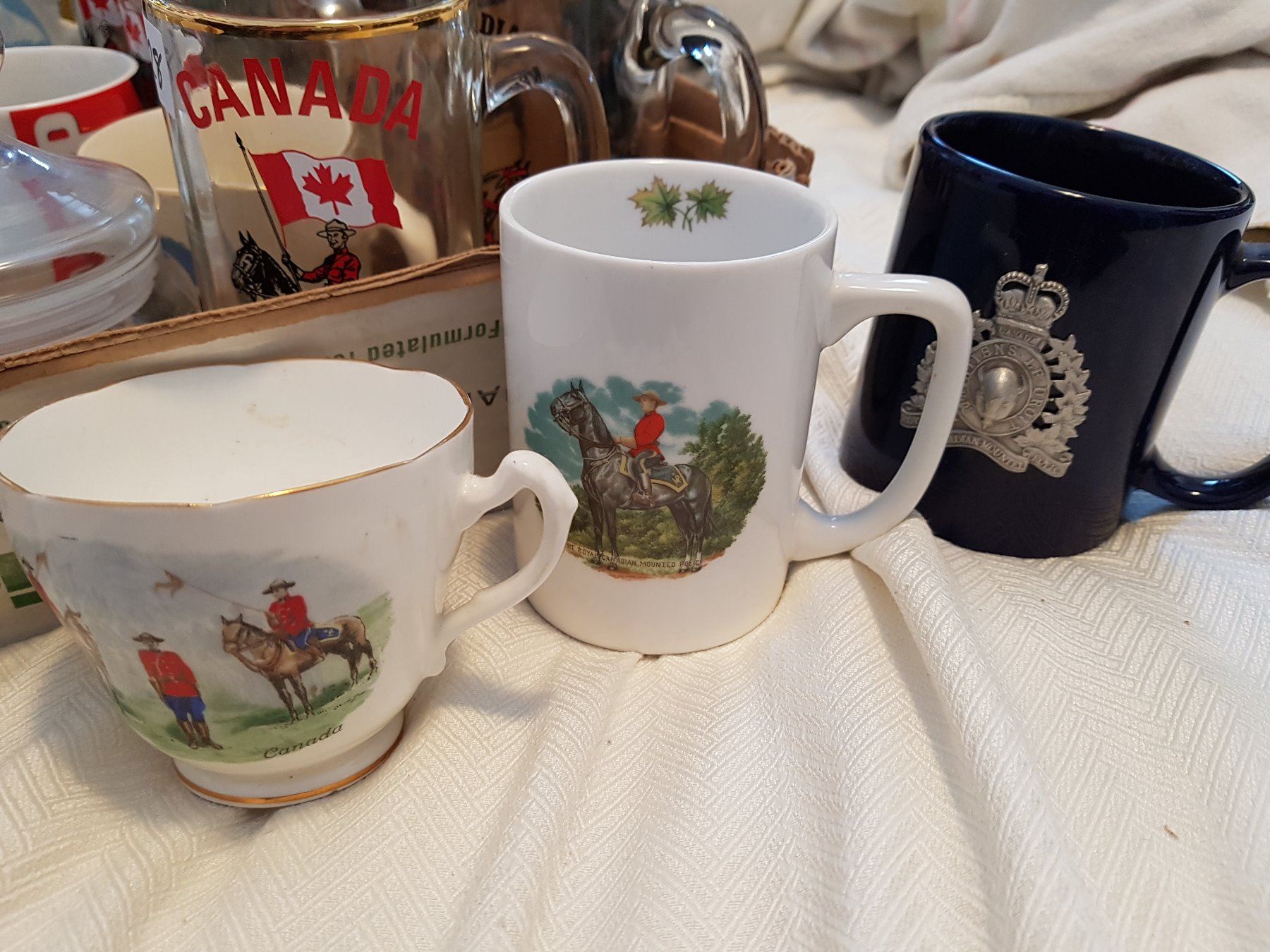 RCMP LOT (CUPS, SAUCERS, MUGS, PLATES, ETC..)