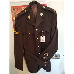 RCMP BROWN SURGE WITH SHOULDER BADGES AND CRESTS