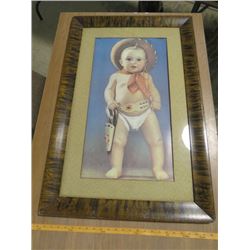 FRAMED PRINT OF KID COWBOY WEARING HOLSTER (24" X 36" X 5")