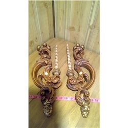 Two wall hanging wooden candle holders with candles