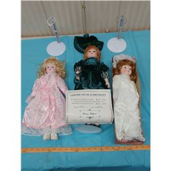 THREE PORCELAIN DOLLS AND STANDS