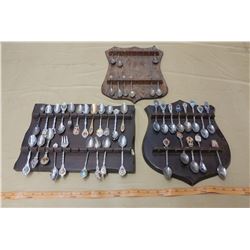 LOT OF ASSORTED DISPLAY RACKS AND SPOONS