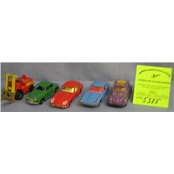 Group of five vintage cast metal vehicles