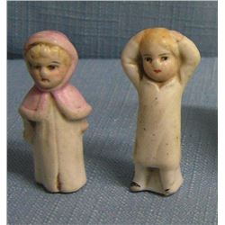Pair of miniature porcelain dolls