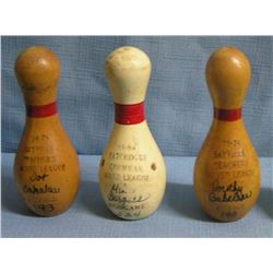 Group of three bowling award pins