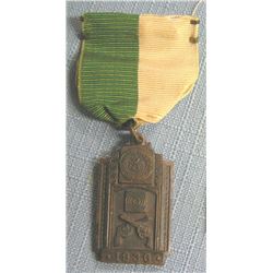 Early policeman?s handgun award medal and ribbon