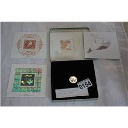 UNCIRCULATED MILLENNIUM QUARTER AND STAMPS