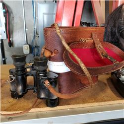 BINOCULARS IN LEATHER CASE