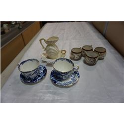 BELLEEK CREAMER, ROYAL CROWN DERBY CUPS AND SAUCERS, AND PORTRAIT CUPS