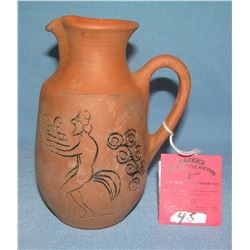 Hand painted earthenware pitcher