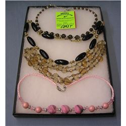 Group of costume jewelry necklaces