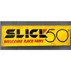 SLICK 50 VINYL BANNER