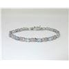 Image 1 : Blue Topaz & Diamond Tennis Bracelet