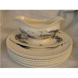 7 plates & Gravy Bowl Castle on the Lame