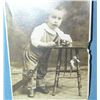 Image 2 : Early photo post card featuring a young boy with toys