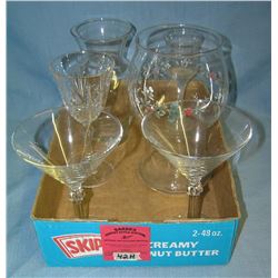 Box full of vintage glass and crystal drink glasses