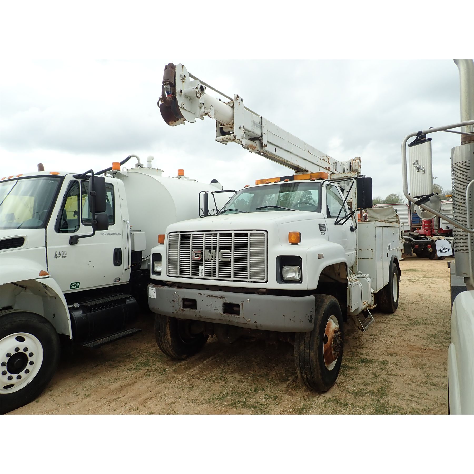 1998 GMC C7500 Boom / Bucket / Crane Truck J.M. Wood Auction Company, Inc.