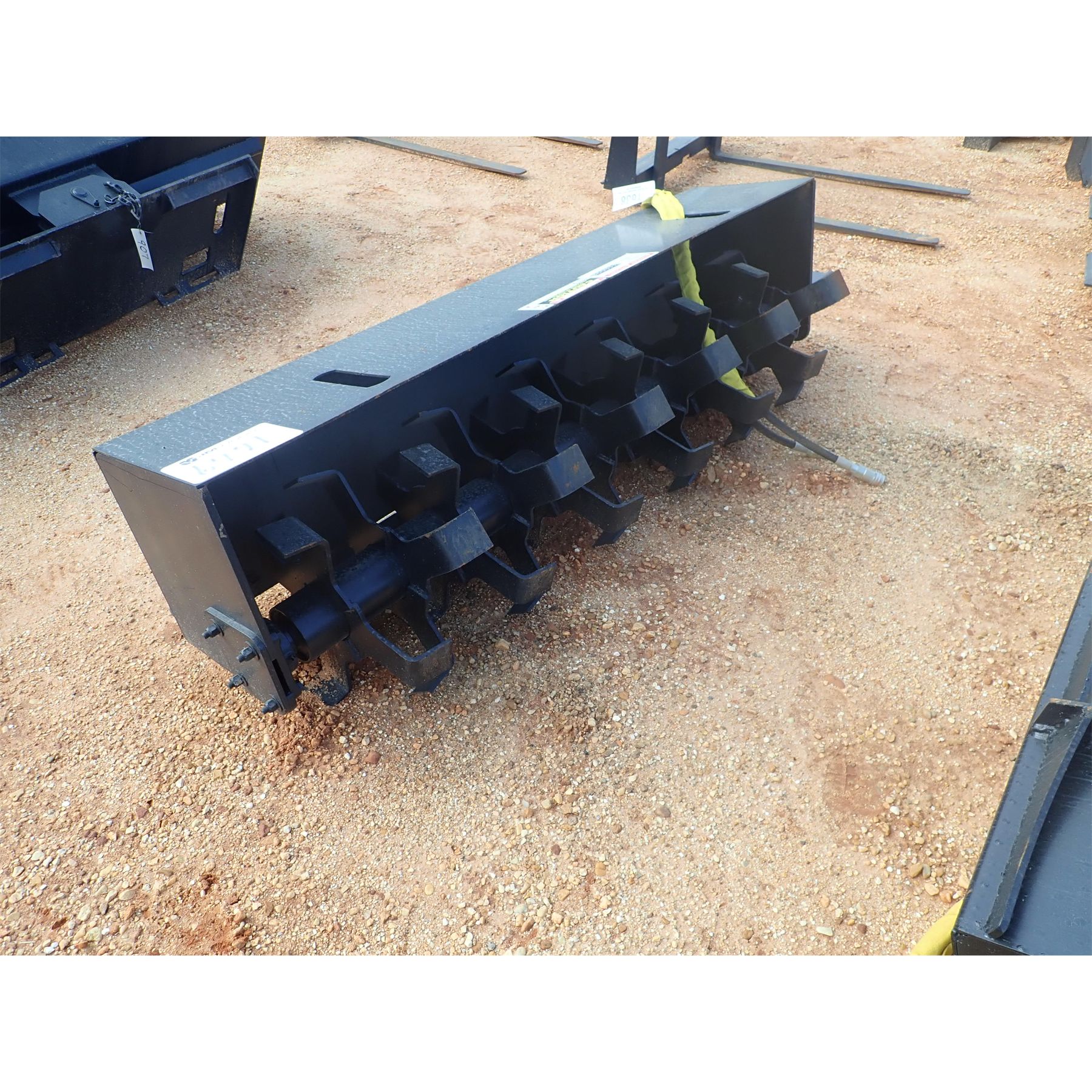 Skid Steer Attachment J.M. Wood Auction Company, Inc.